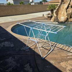 Foldable Clothes Dryer Rack. We Use At Our Swimming Pool To Dry Our Swim Wear.