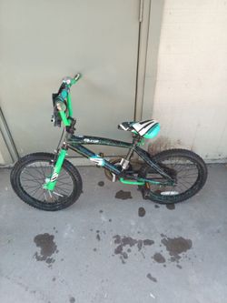 Two kids boys green / black bikes