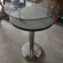 Bar Stool Style Table With Glass On Top Great For Holding Your Drinks Underneath