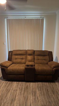 PRICE REDUCED - MUST SELL- $325  OBO Brown Reclining Loveseat w/ Center Console & Cup Holders