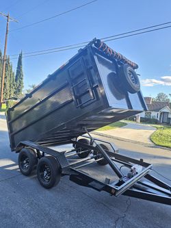 NEW DUMP TRAILER 8X12X4 12000 LBS
ROLLING TARP--SPARE TIRE,ELECTRIC BRAKES,HYDRAULIC SYSTEM,REMOTE CONTROL,IDEAL FOR HAULING, DEMOLITION, TRASH ETC,FO