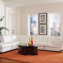 White Leatherette Modular Sectional!  Shown With 5 Pieces Plus Ottoman!