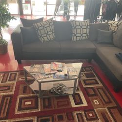 Nice Charcoal Grey Sectional Sofa  Small Glass Table And Decrotive Rug All For $750