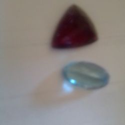 Two Single Gem Stones One Is A Rubellite Tourmaline7.03 Ct The Other Is Aquarium Oval4.61 Ct