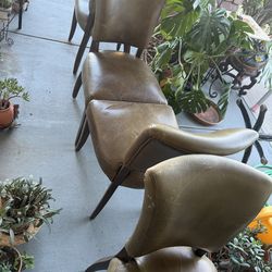 Leather look vinyl chairs, $5 each one.