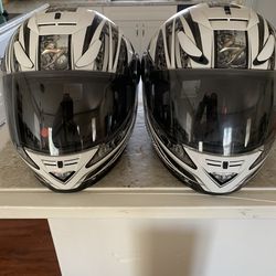 His and her  motorcycle helmets