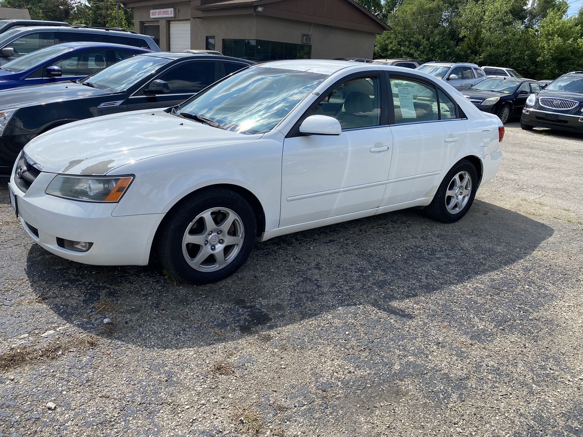 2006 Hyundai Sonata(147K) that’s in excellent mechanical running condition.paint pealing on the hood but it is on it way to the paint shop so no worr