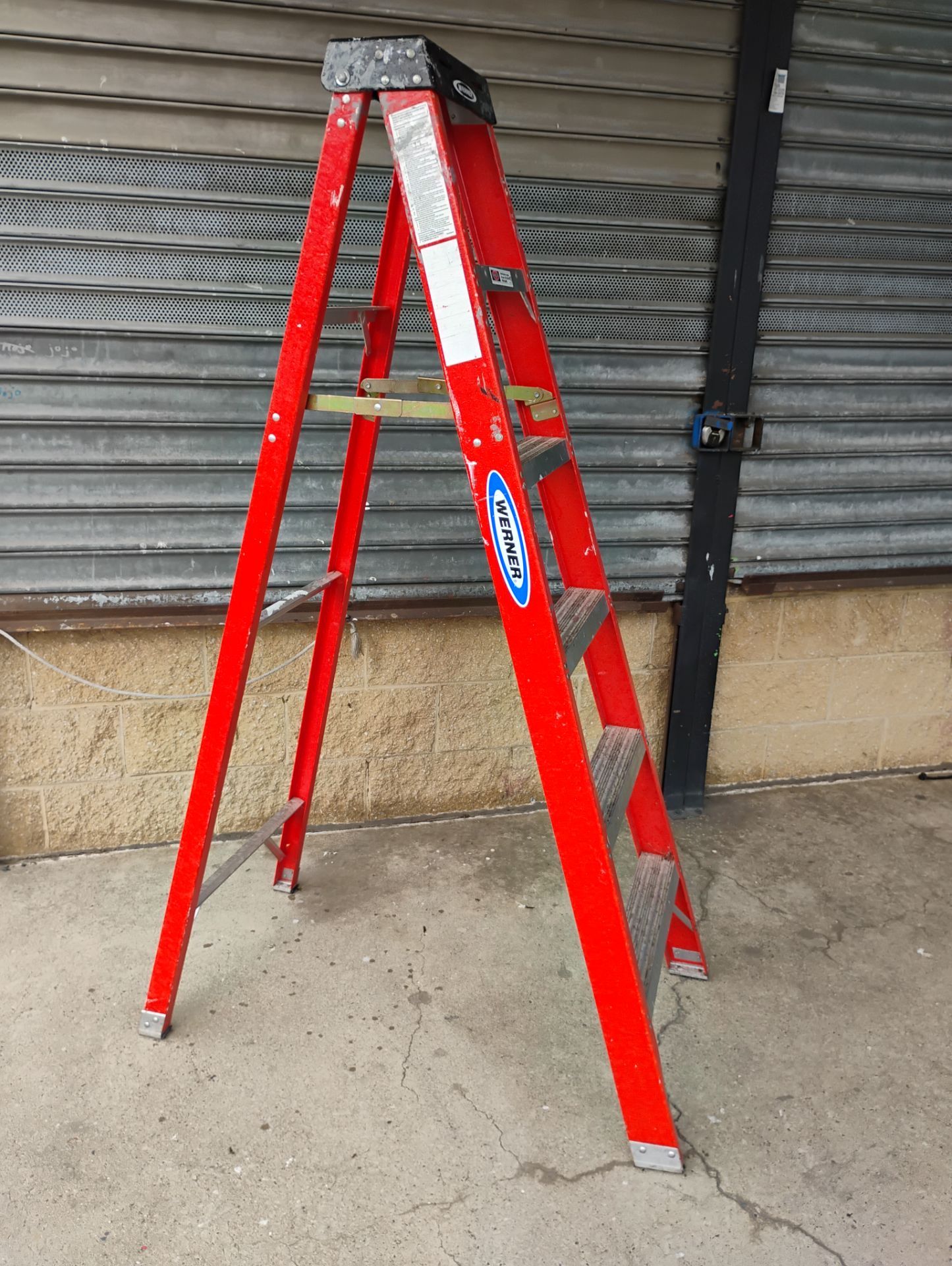 6' Werner fiberglass A-frame step ladder.