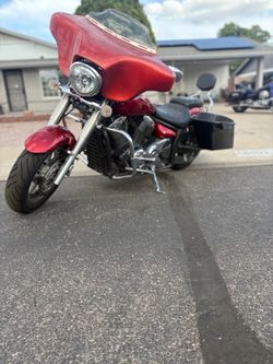 Red Cruiser Motorcycle with Fairing and Saddlebag