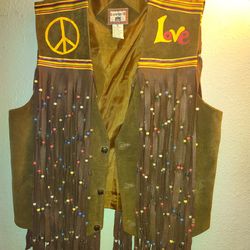 Used vintage Fringed Hippy Vest,/Beaded Leather Vest, good condition Leather Vest.