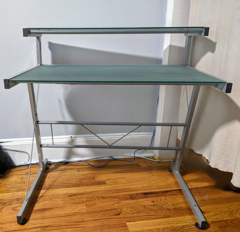 Dual level glass computer desk with metal frame