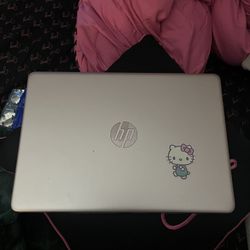 HP black and rose pink laptop (comes with charger)