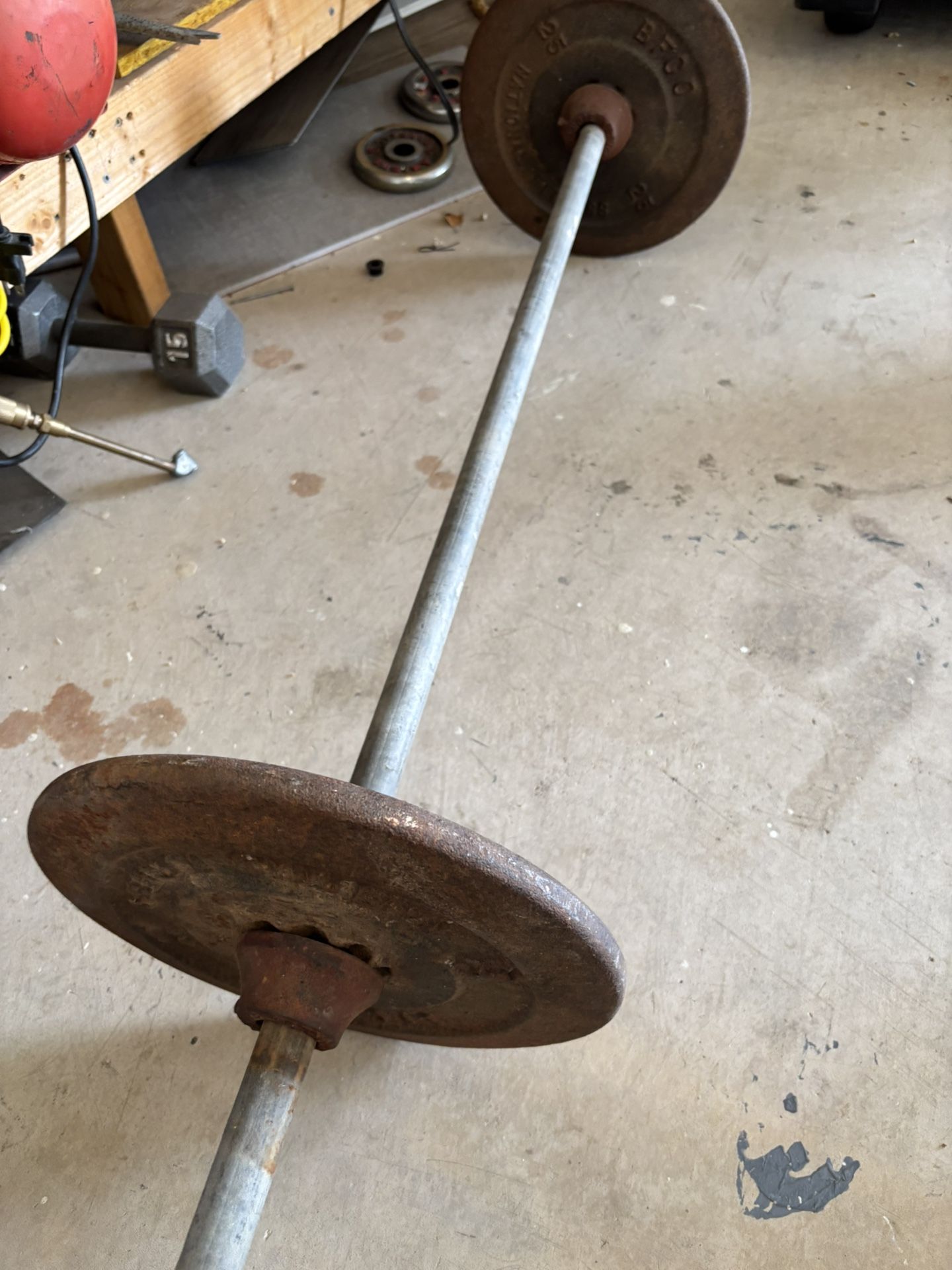 Straight Bar With 50 Lbs Of Weight