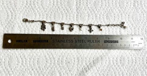 Vintage-retired Brighton silver charm bracelet