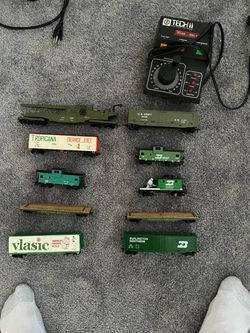 Toy train cars and two transformers