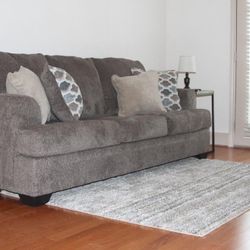Smokey Gray Couch And Pillows