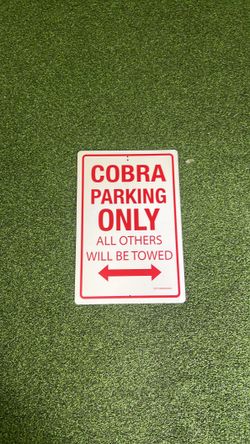 Cobra parking sign