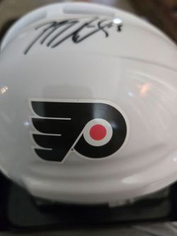 Autographed mini helmet of former flyer Mike richards with coa
