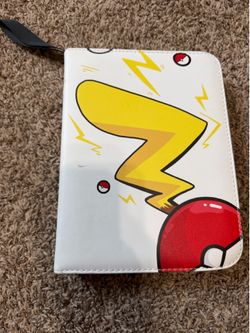Assorted Pokémon cards with binder 138 regular and 2 large cards