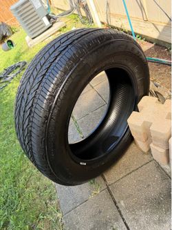 One Bridgestone tire 245/60R18