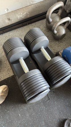 Automatic adjustable dumbbells