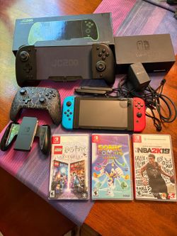 Nintendo Switch 1 with Dock, 3 games, third party pro controller, and more