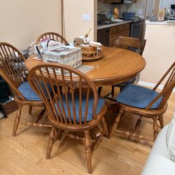 Oak table with chairs & two inserts