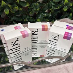 New Dibs Baked Blush Duos in shades Pop Star, Spice Gal, and VIP Pink. Each unit is a 0.3 oz (8.5 g) compact. The packaging is white with silver and p