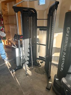 Spire Cable machine with grips and bench