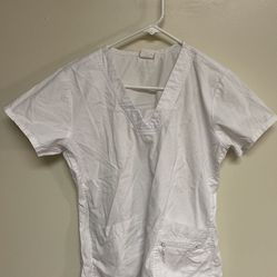 CA. PRIMA SIZE MEDIUM WHITE SCRUBS. 3 POCKET INCLUDING ZIPPERED POCKET. 