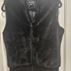 FAUX FUR VEST.      SZ. MED.   15.00