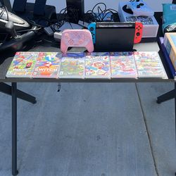 Nintendo Switch + Pro Controller + Games