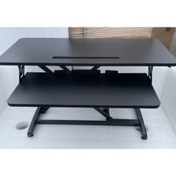 Desk Converter, Height Adjustable Riser, Sit to Stand Dual Monitor Table. 34 1/2 Inches Wide. Uses Shock To Lift Table