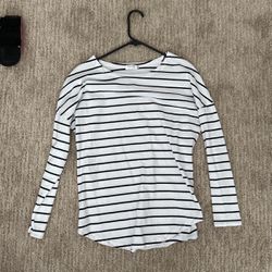 Long Sleeved Striped Shirts Black Vest And Two long sleeved striped shirts
