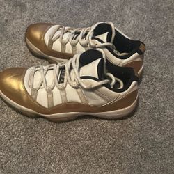 Jordan 11 Low Retro Gold Edition