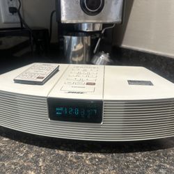 Introducing the BOSE Wave Radio AWR1-1W, a top-of-the-line home audio product made in the United States. This radio is designed to provide superior so