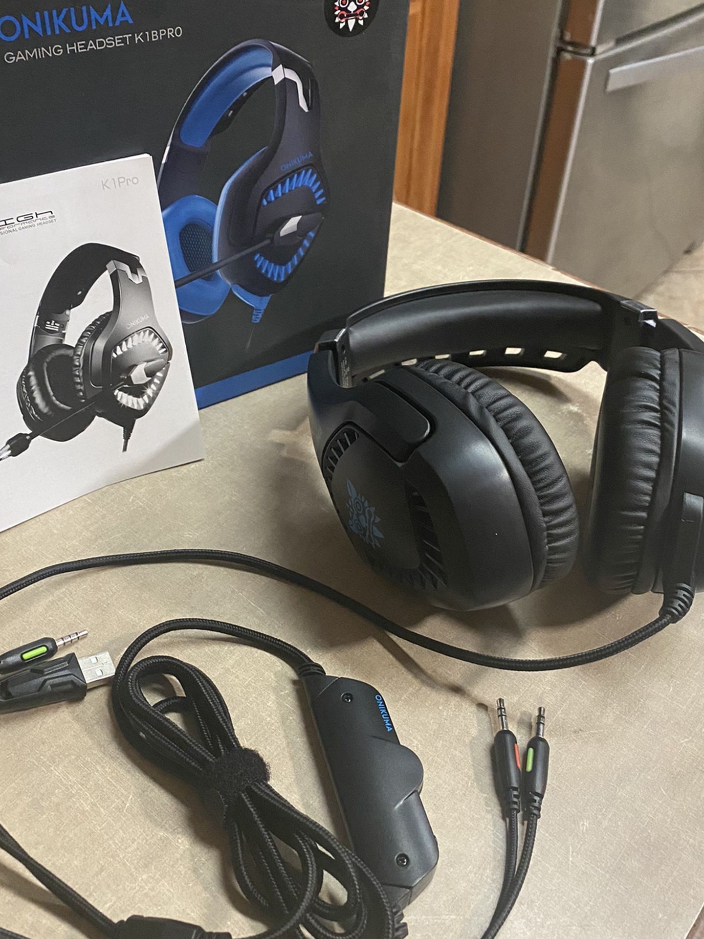 Onikuma New Gaming Headset for PS4, Xbox One (Adapter Not Included), PC with 7.1 Surround Sound, Noise Cancelling Mic, Zero Ear Pressure & D
