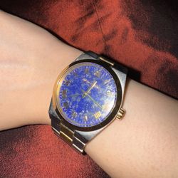 Michael Kors Channing MK5893 women's watch with a two-tone stainless steel bracelet and a genuine lapis dial