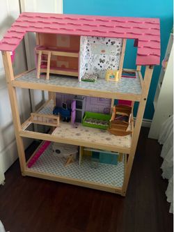 Wood made double sided playhouse