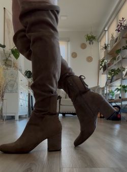 Brown knee high boots