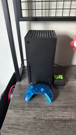 Xbox Series X with two controllers