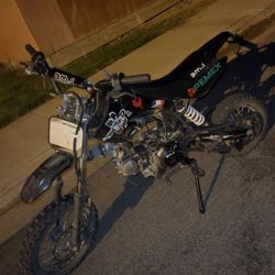 Dirtbike 125 And An Electric Scooter