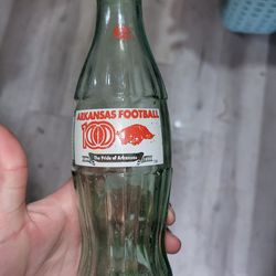 Coca - Cola  Arkansas Razorbacks Football Team 100 Year Anniversary Bottle. 