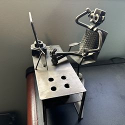 Nuts And Bolts Man At Desk