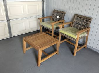 Outdoor patio wood chairs with coffee table and cushions