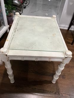 A vintage , mid century, coffe table, color white (28” long x 21” wide x 20” high)