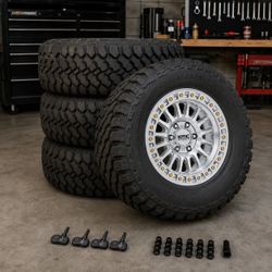 (4) KMC IMS Gloss Silver W/ Machined Face 18x9 8x165.1 0mm 35x12.5xR18 MT Tire Package Jeep  Chevy 2500 3500 Dodge Hummer GMC