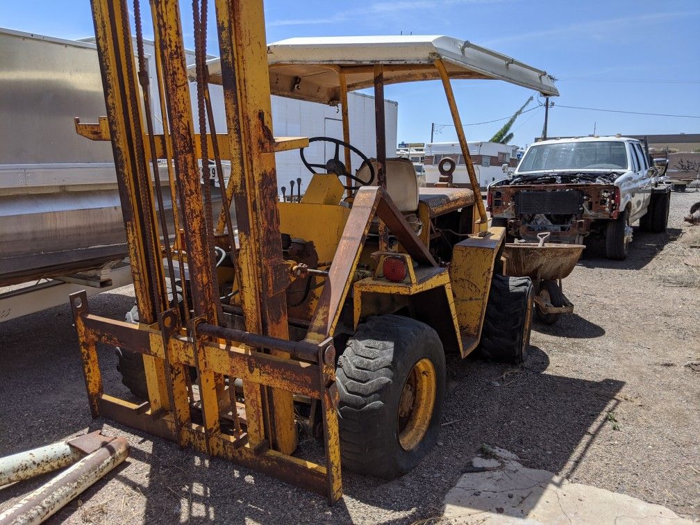 Wiggins ? forklift with title used this forklift goes for $10,000 to $$16,00 so do the math it has great potential