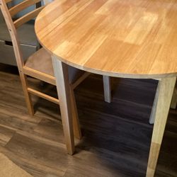 Small dining table and two chairs