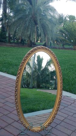 A Gold Gorgeous Large Decorative Mirror 35"in Height 20" in Width